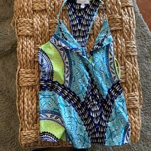 Girls Delias razor back multi color top.